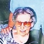 Irmgard Weinberg, eine ältere Frau mit kurzen grauen Haaren und einer leicht getönten Brille.